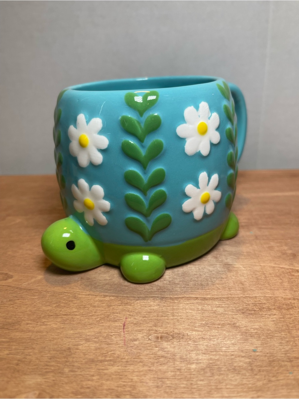 Blue Turtle Ceramic Planter with White Daisy Motif